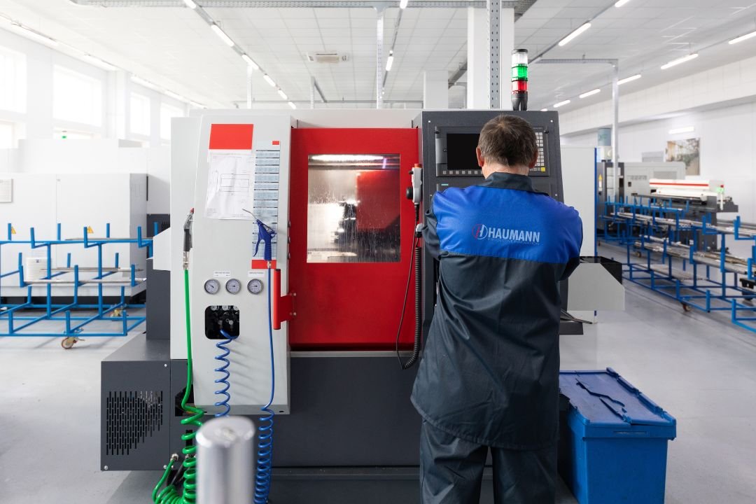 CNC machining OEM manufacturer producing precision parts for industrial programs